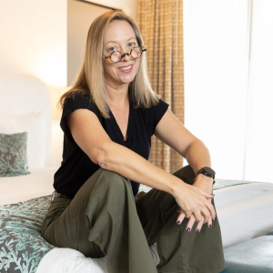 chris bio pic in white shirt with blue and gray tie and vest